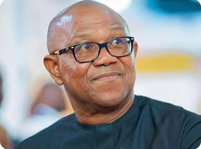 Peter Obi wearing glasses and a dark outfit