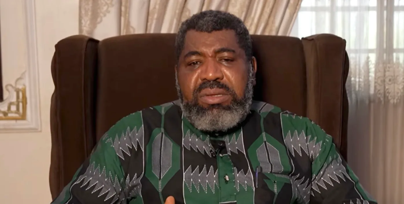 Anthony Kila seated indoors during a recorded interview
