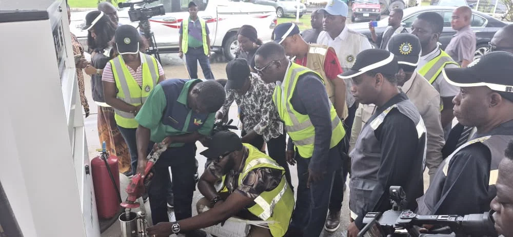 NMDPRA officials inspecting fuel dispensing equipment at a filling station in Port Harcourt
