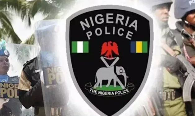 Nigeria Police emblem displayed in front of police personnel