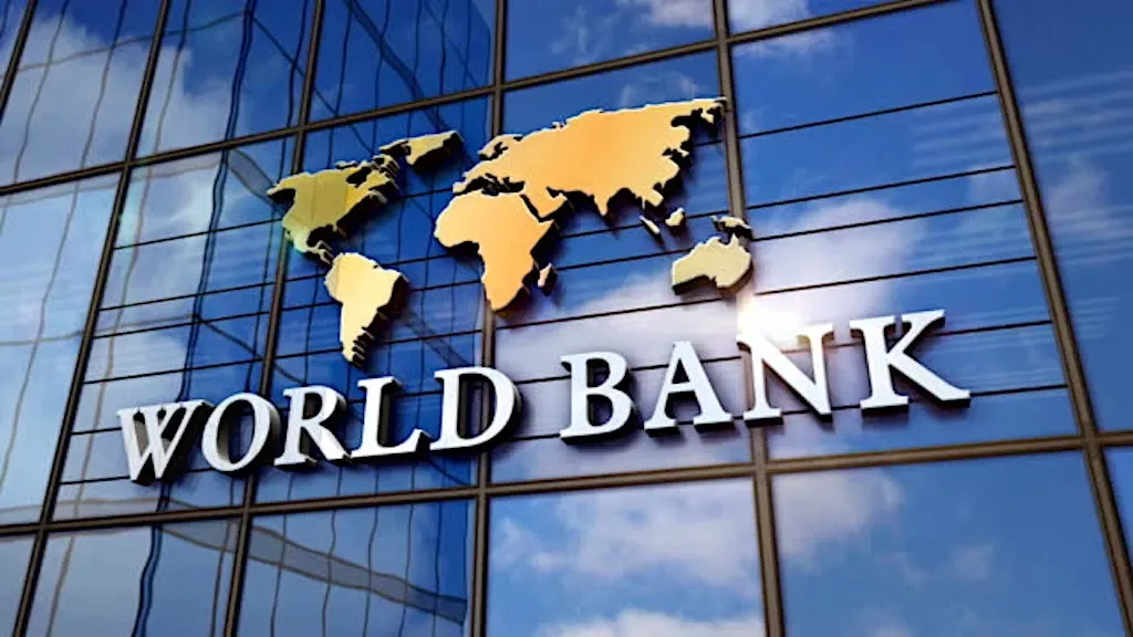 World Bank name and world map emblem displayed on the exterior of a glass building