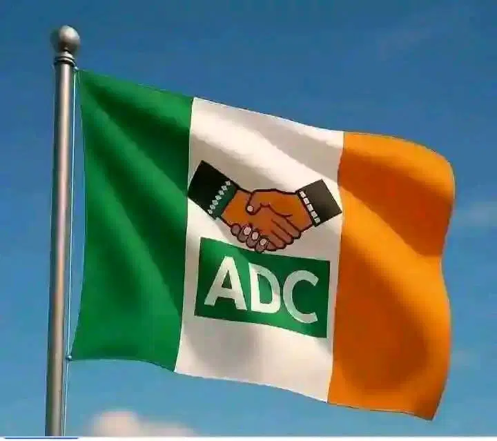 African Democratic Congress flag flying against a blue sky