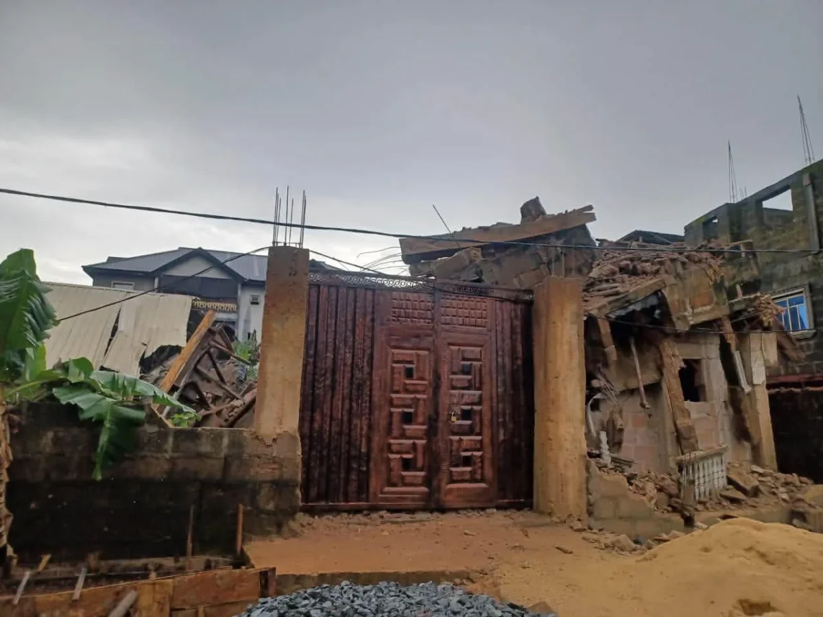 Rubble and damaged structures at the site of a building collapse in Okpoko, Anambra State