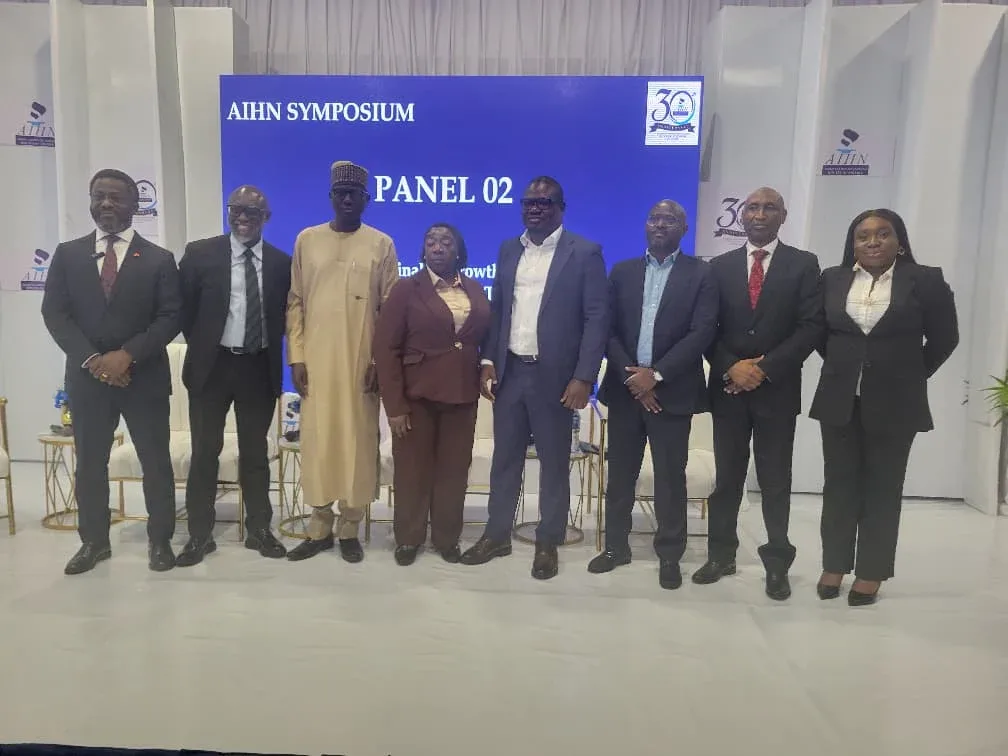 Participants standing together at the AIHN 30th anniversary symposium in Lagos