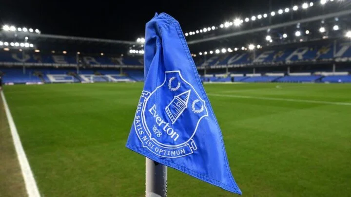 Everton club flag on a corner post inside a football stadium
