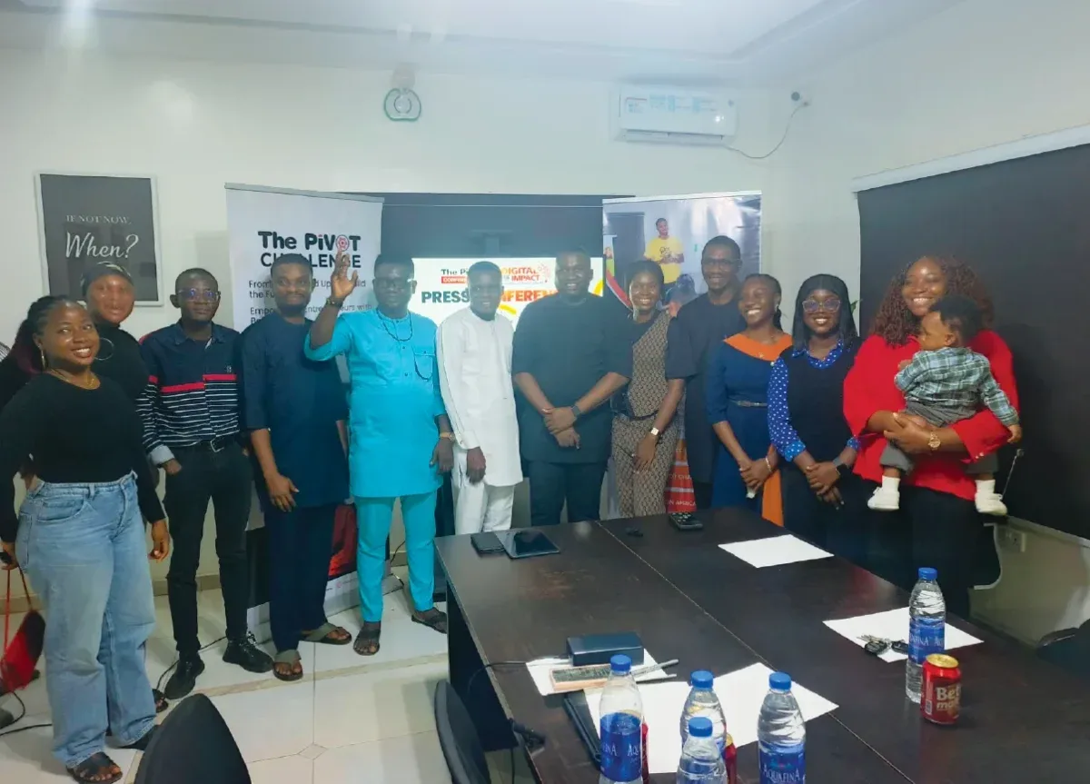 Speakers and participants standing together during a media session for The Pivot conference in Awka